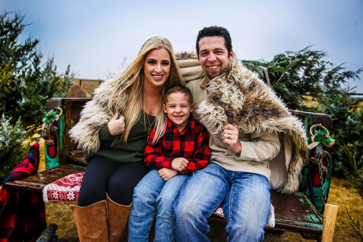 Kara Kenny and her husband Brandon with their son Preston.