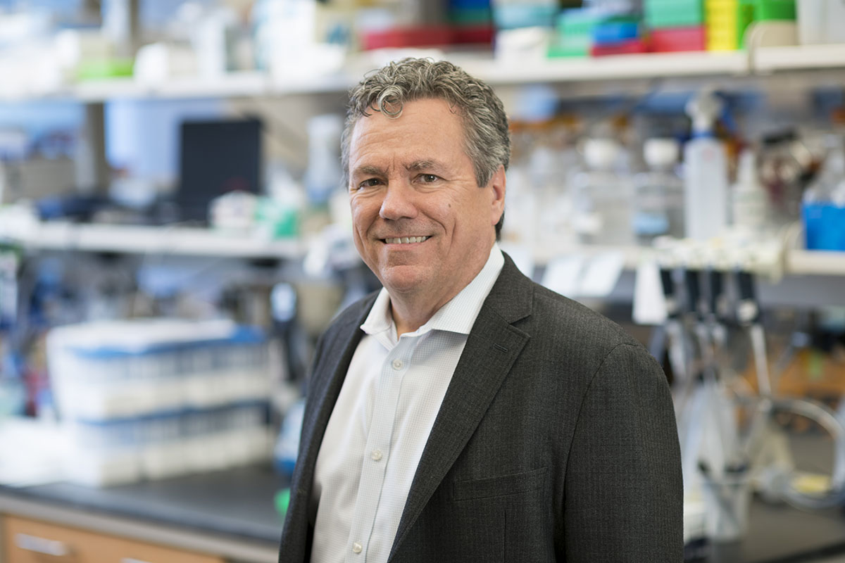 Caner biologist Scott Lowe in his lab